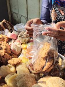 Person Using Asia Cakra Ceria Plastic Bag Tas Kresek to store tofu